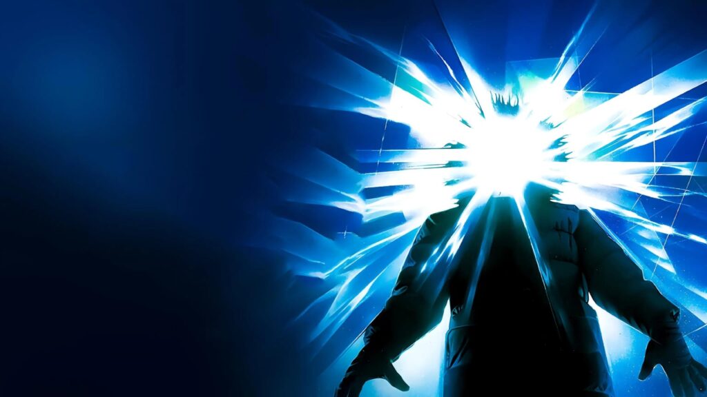Blue-toned cinematic illustration of a dark silhouetted figure whose head area bursts into bright white light and sharp glass-like shards, with empty dark space on the left.