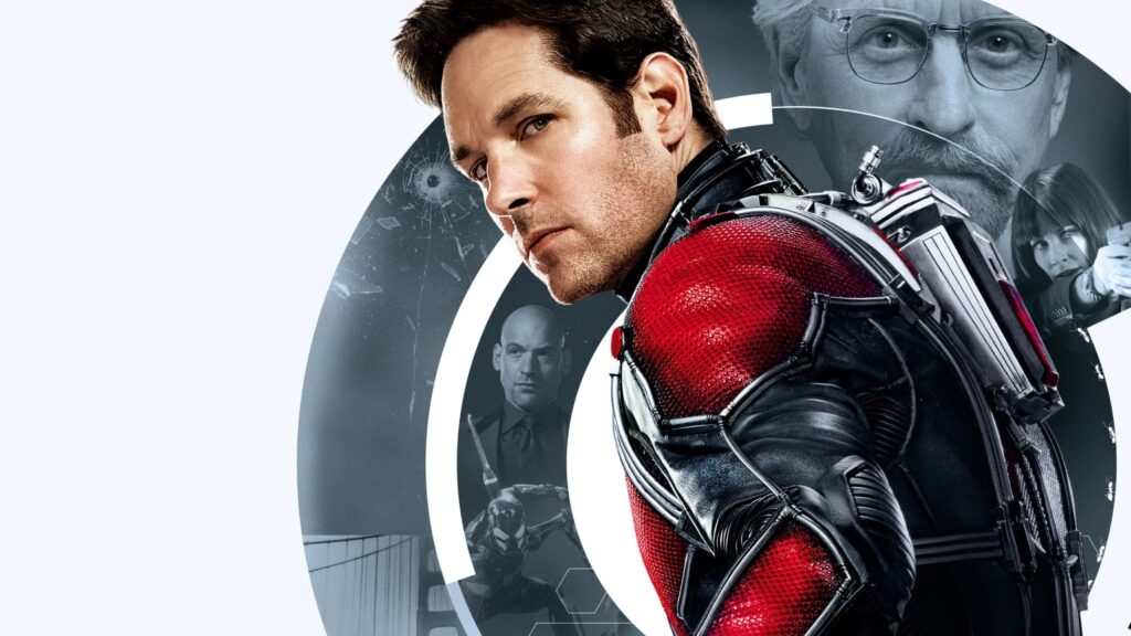 Promotional-style collage showing a man in a red-and-black armored suit in the foreground, with several grayscale faces and circular graphic rings behind him on a pale background.